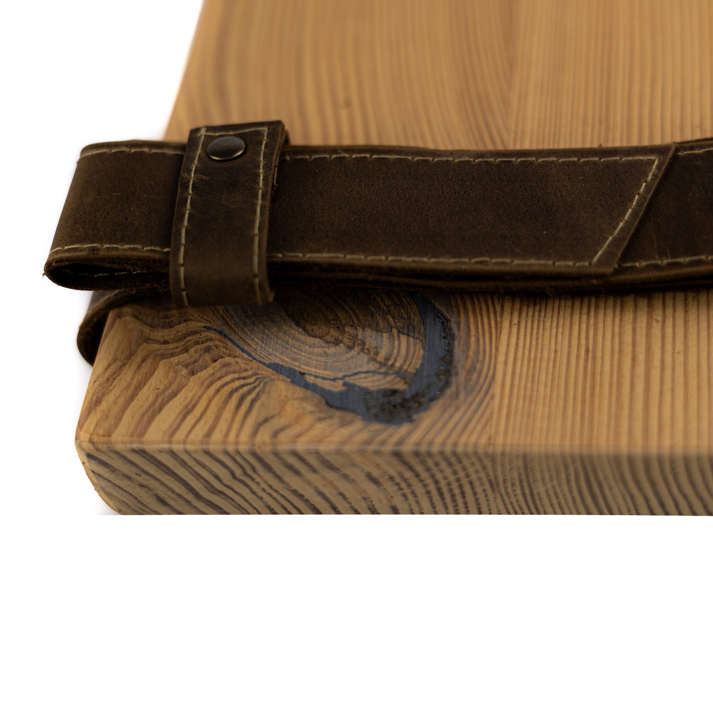 Close-up of natural pine wood grain and genuine leather straps
